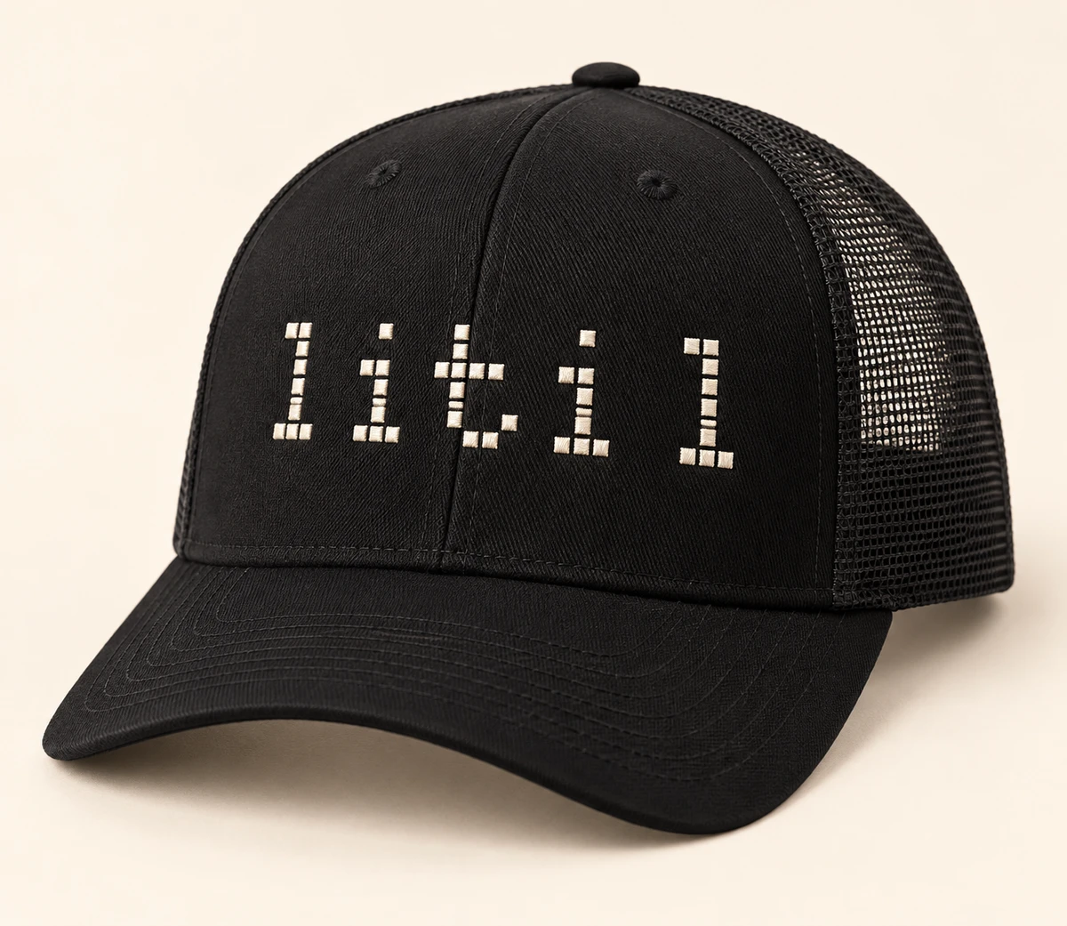 Structured black LiTiL logo trucker hat with embroidered logo and mesh back